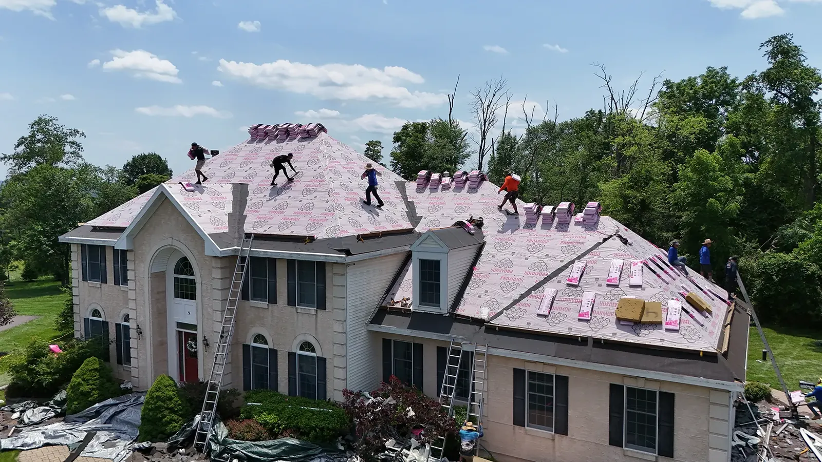 New roof with skylights, gutters and gutter guards in Flemington, NJ, Teak shingles