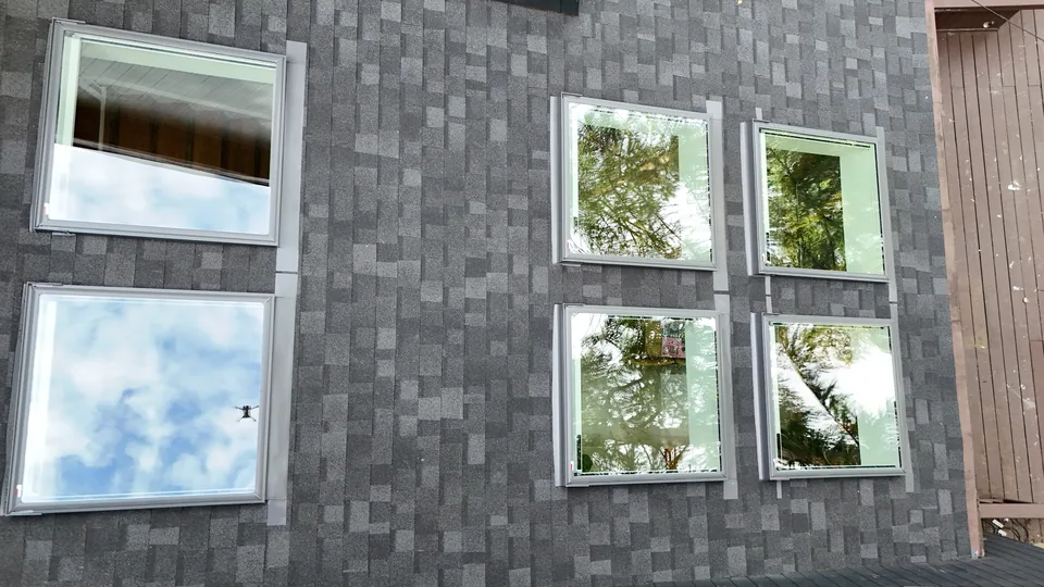 Finished Onyx Black shingles detailed around the new VELUX skylights in Marlboro, NJ
