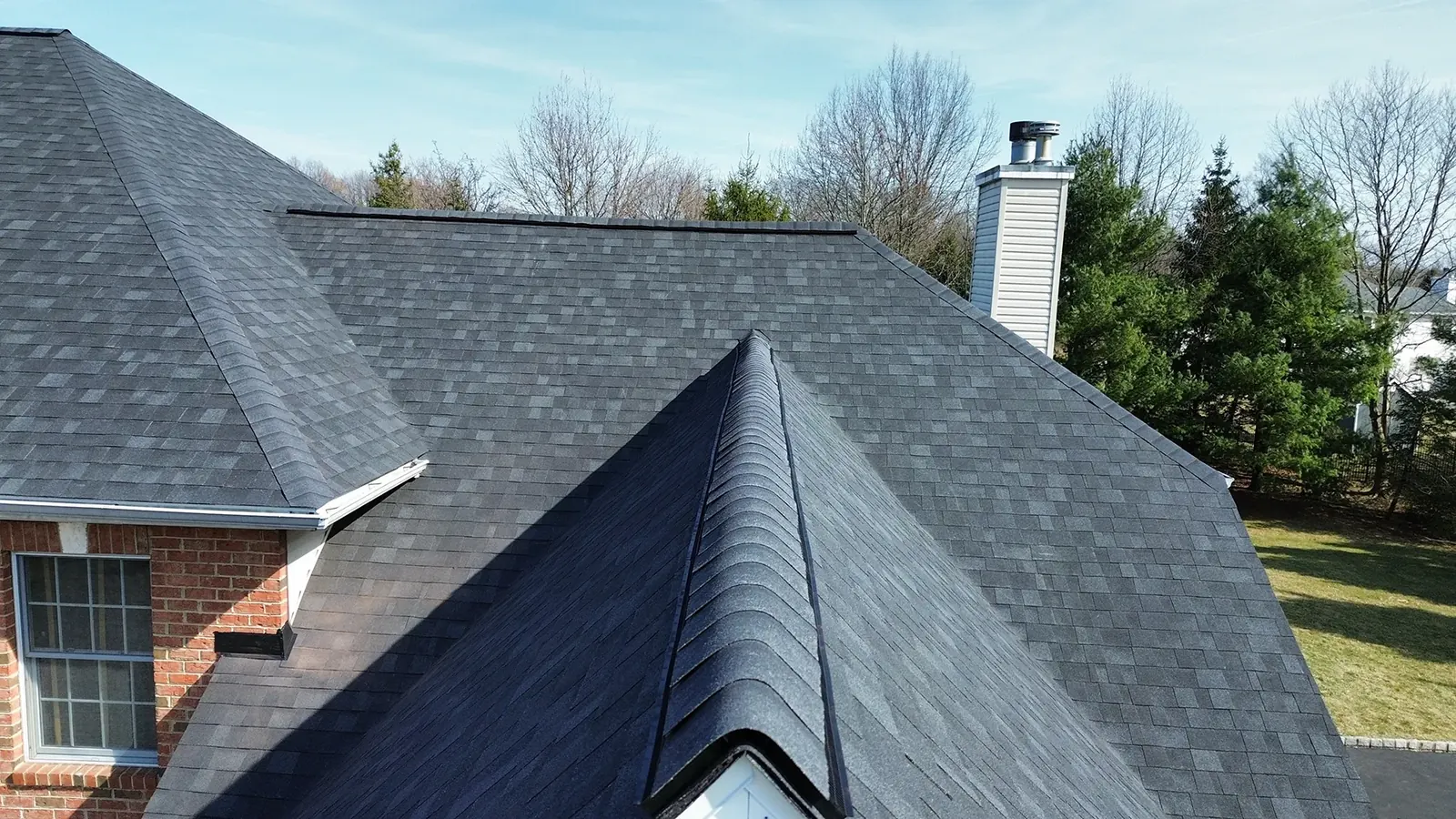 New roof with skylights in Warren, NJ, Owens Corning Duration shingles in Onyx Black