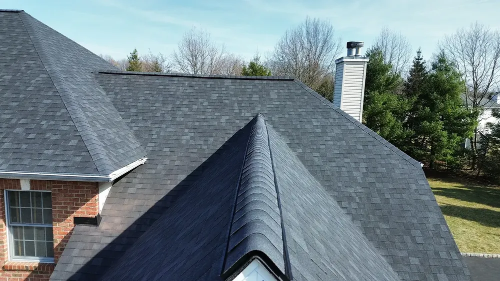 New roof with skylights in Warren, NJ, Owens Corning Duration shingles in Onyx Black